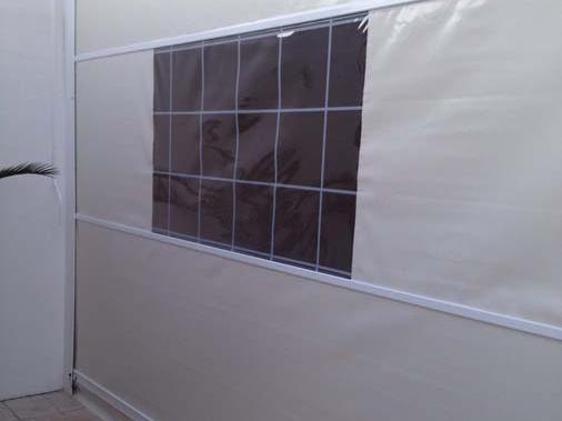 Toldo vertical con ventana